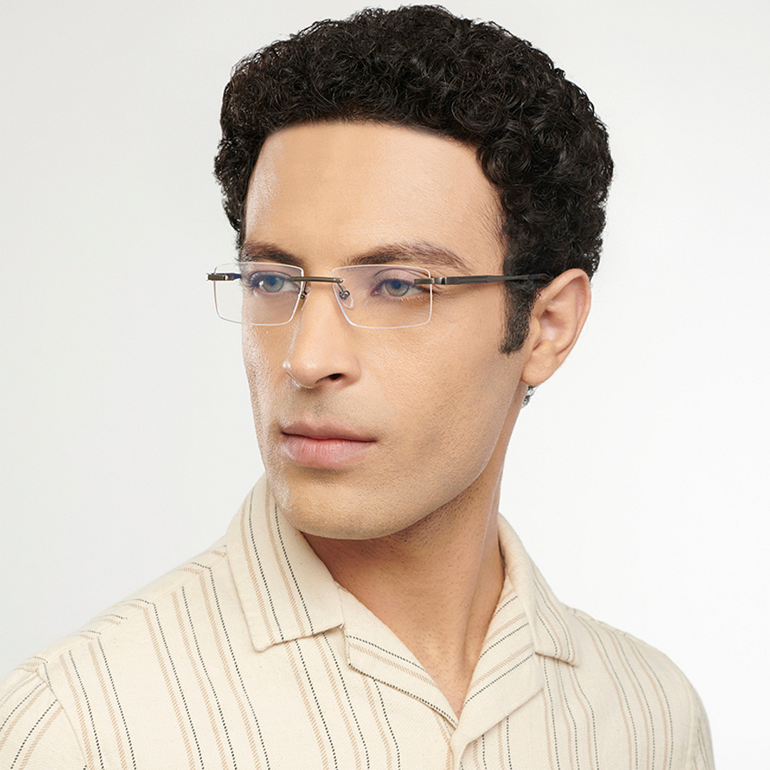 John Jacobs Online Gunmetal Rimless Rectangle left side