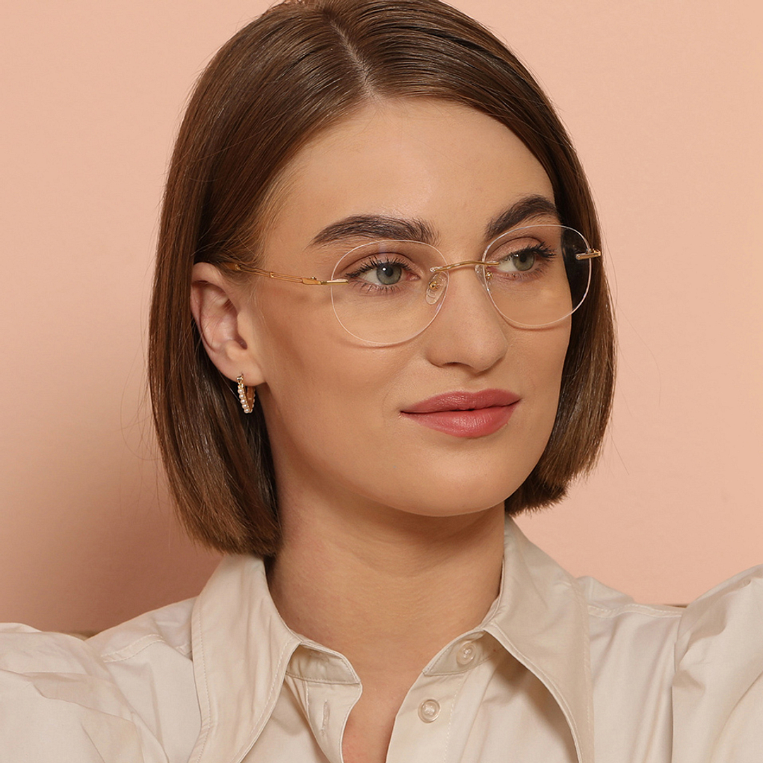 John Jacobs Online Gold Rimless Round left side