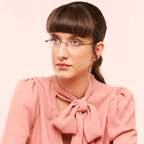 John Jacobs Online Dark Gunmetal Rimless Round left side