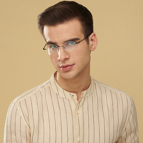 John Jacobs Online Dark Gunmetal Rimless Round left side