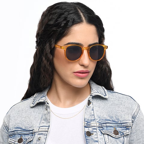 OJOS Yellow Transparent Full Rim Round left side OJOS Yellow Transparent Full Rim Round left side