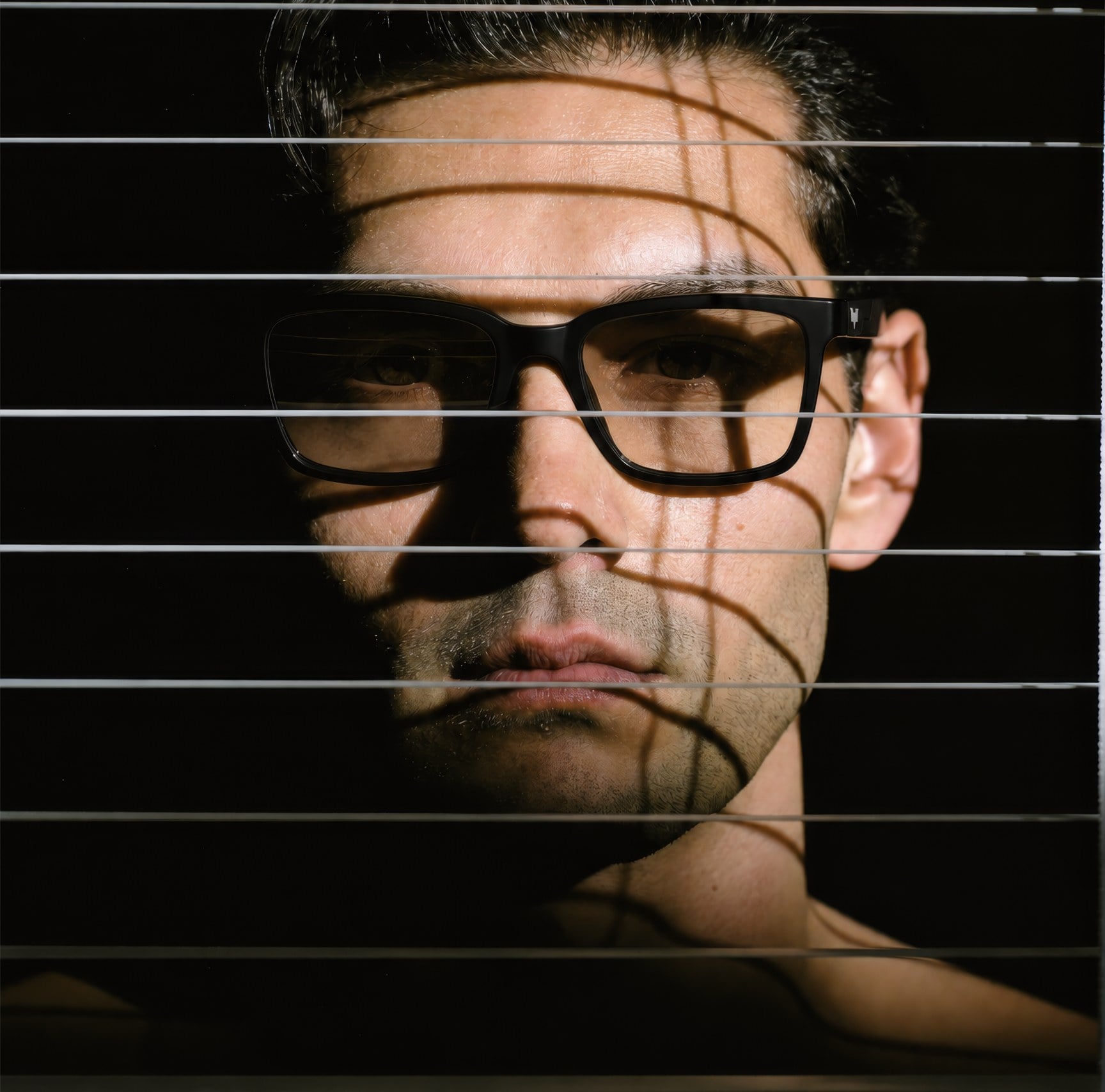 Man wearing Hustlr Dark Knight eyeglasses