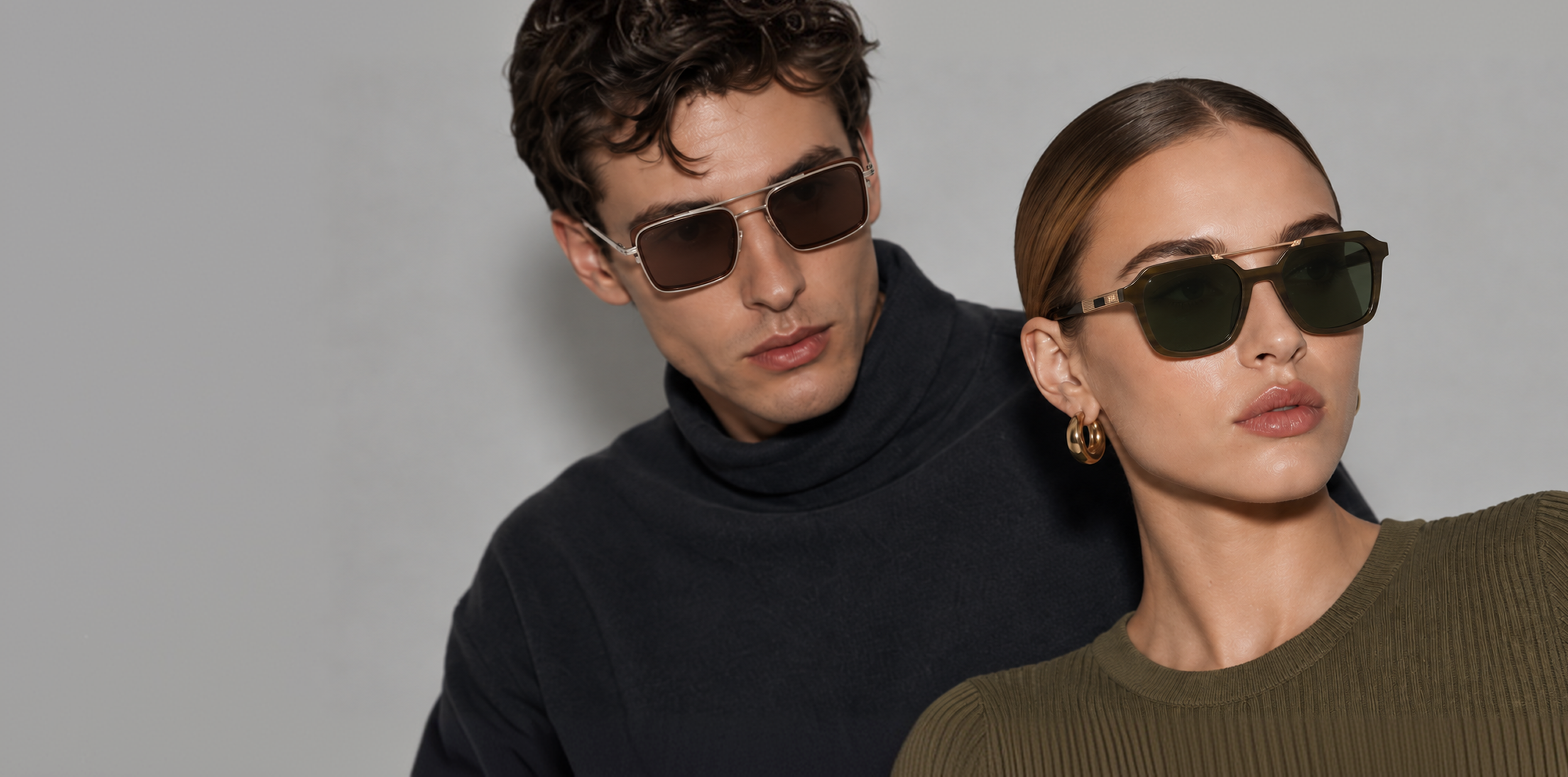 Man and woman modelling trending eyewear styles